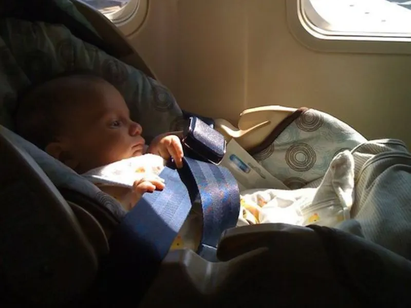 Traveling With A Car Seat Tips for Family Travel • Flying With A